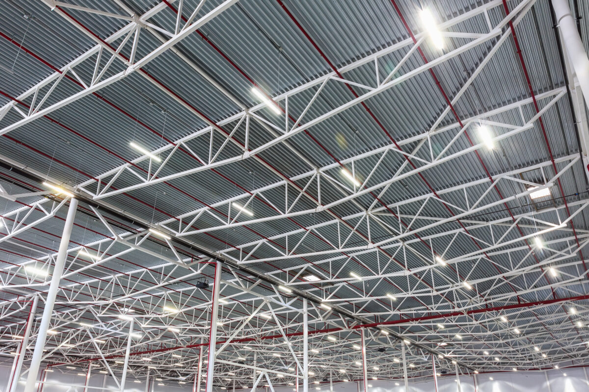 ceiling lamps with tube lighting in a modern warehouse